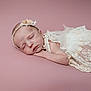 Zoé participe au concours pour gagner de l'argent avec cette photo : adorable, baby, child, closeup, cute, delicate, flower, headband, infant, lace_dress, newborn, peaceful, pink_background, portrait, resting, skin, sleeping, small, soft_texture, tender