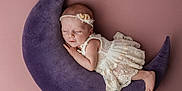 Zoé participe au concours pour gagner de l'argent avec cette photo : adorable, baby, child, cozy, crescent_moon_pillow, cute, delicate, headband, infant, lace_dress, newborn, peaceful, pink_background, plush, portrait, resting, sleep, sleeping, soft_texture, young