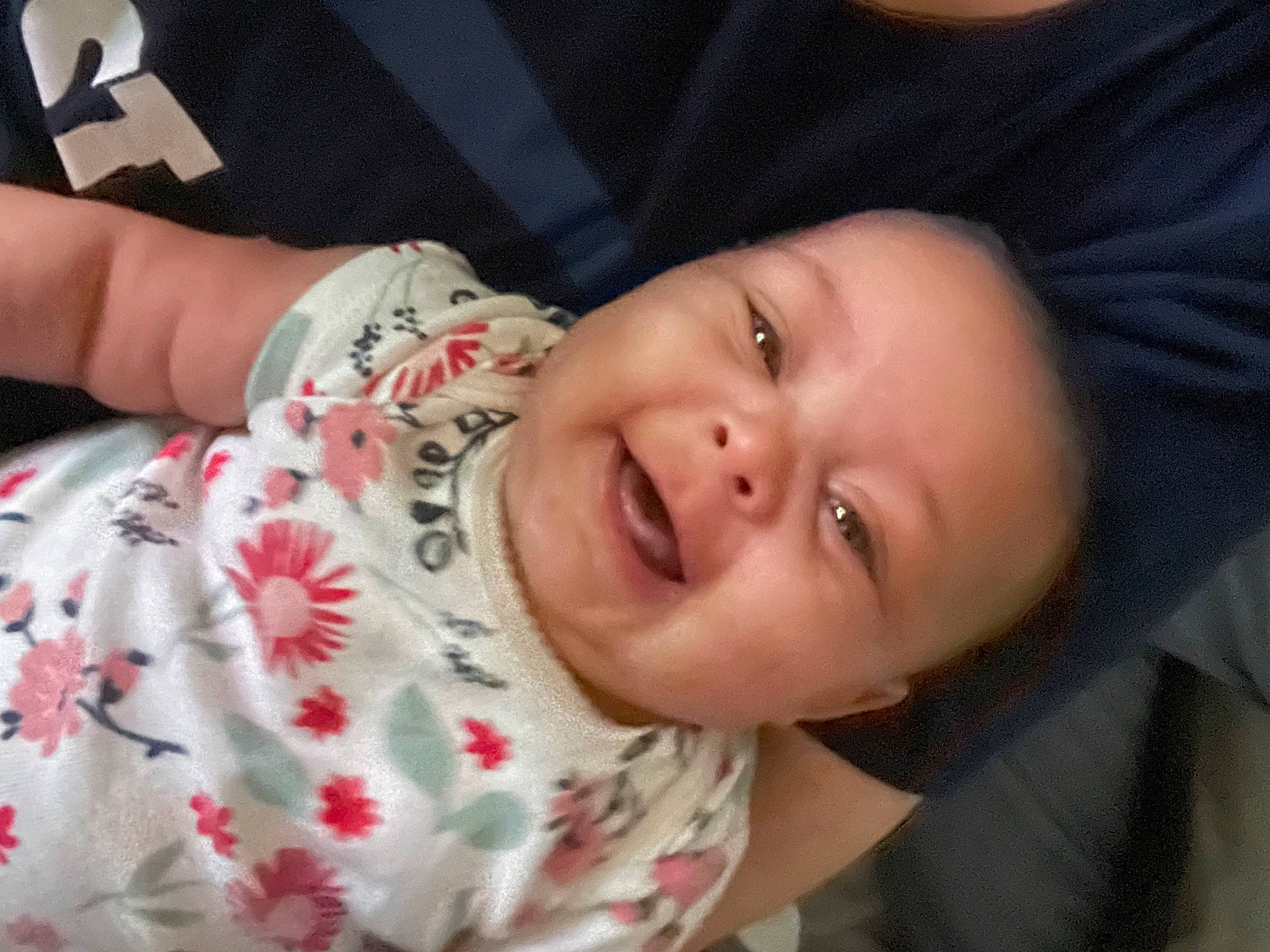 Raeleigh joined the competition — help win amazing prizes! arm, baby, baby_toddler_clothing, cheek, eyebrow, eyelash, finger, gesture, hand, happy, human_body, iris, lip, mouth, neck, nose, person, skin, sleeve, smile