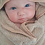 Ambre a rejoint le concours — aidez-le/la à gagner de superbes lots ! baby, blue_eyes, towel, hood, wrapped, cute, infant, soft_texture, skin, face, portrait, child, newborn, cozy, closeup, expression, warm, indoors, person, blanket