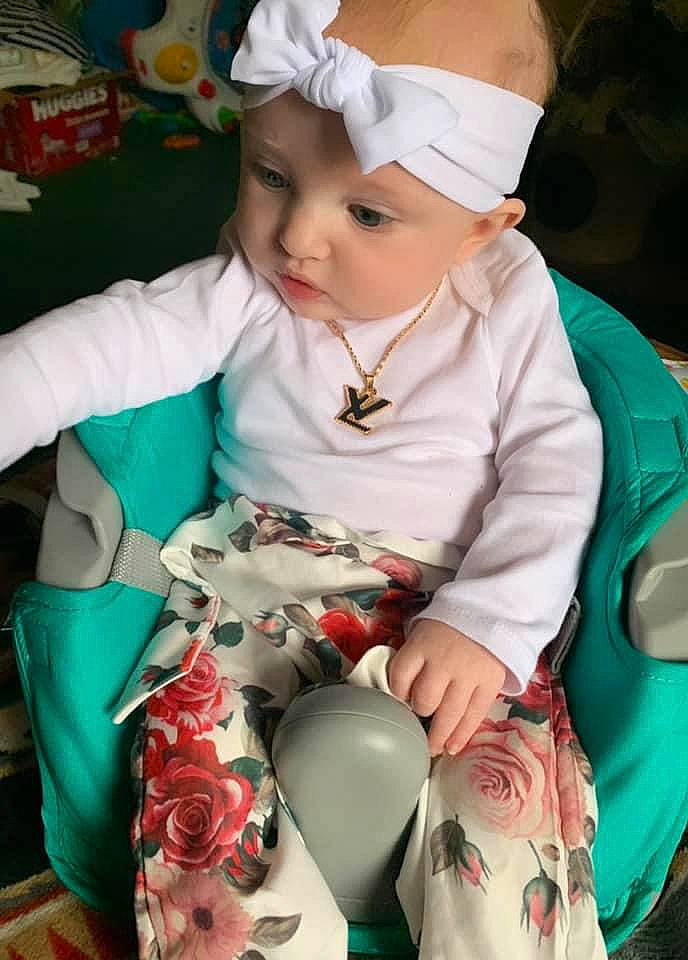 Kinslee joined the competition — help win amazing prizes! baby, baby_toddler_clothing, child, costume_hat, event, eye, fictional_character, fun, happy, hat, head, headwear, holiday, lap, pattern, person, pink, sitting, sleeve, textile