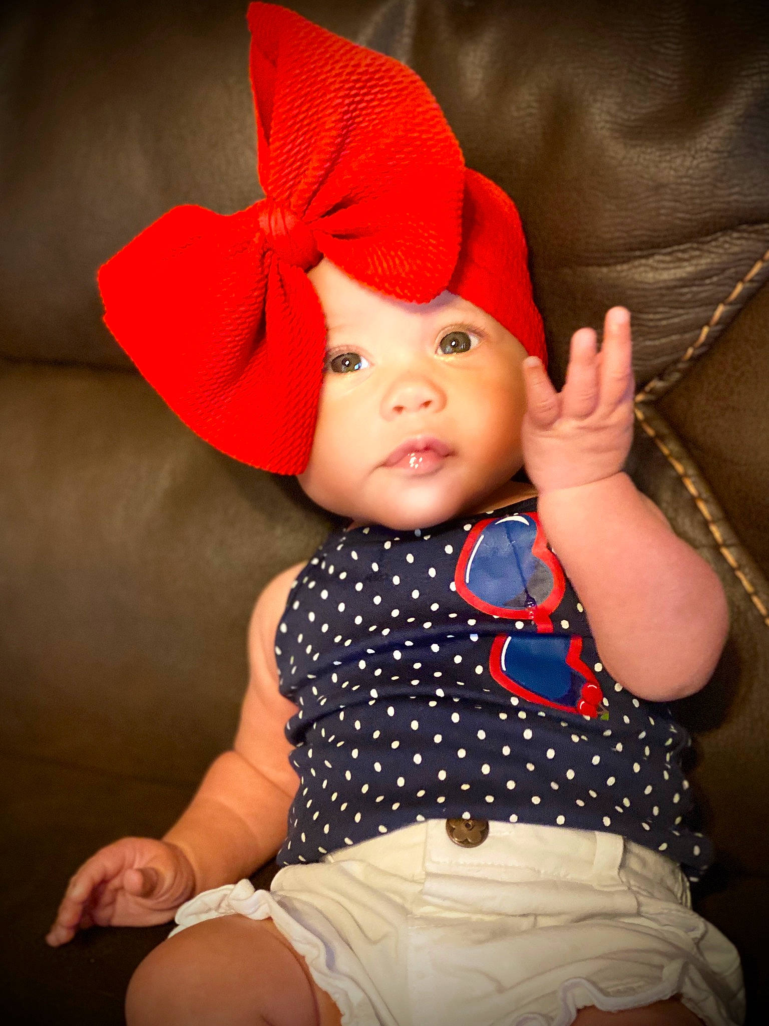 Mykah joined the competition — help win amazing prizes! baby, child, clothing, costume, costume_accessory, costume_hat, fashion_accessory, hat, headgear, headwear, orange, person, photography, red, skin, smile, sun_hat, toddler