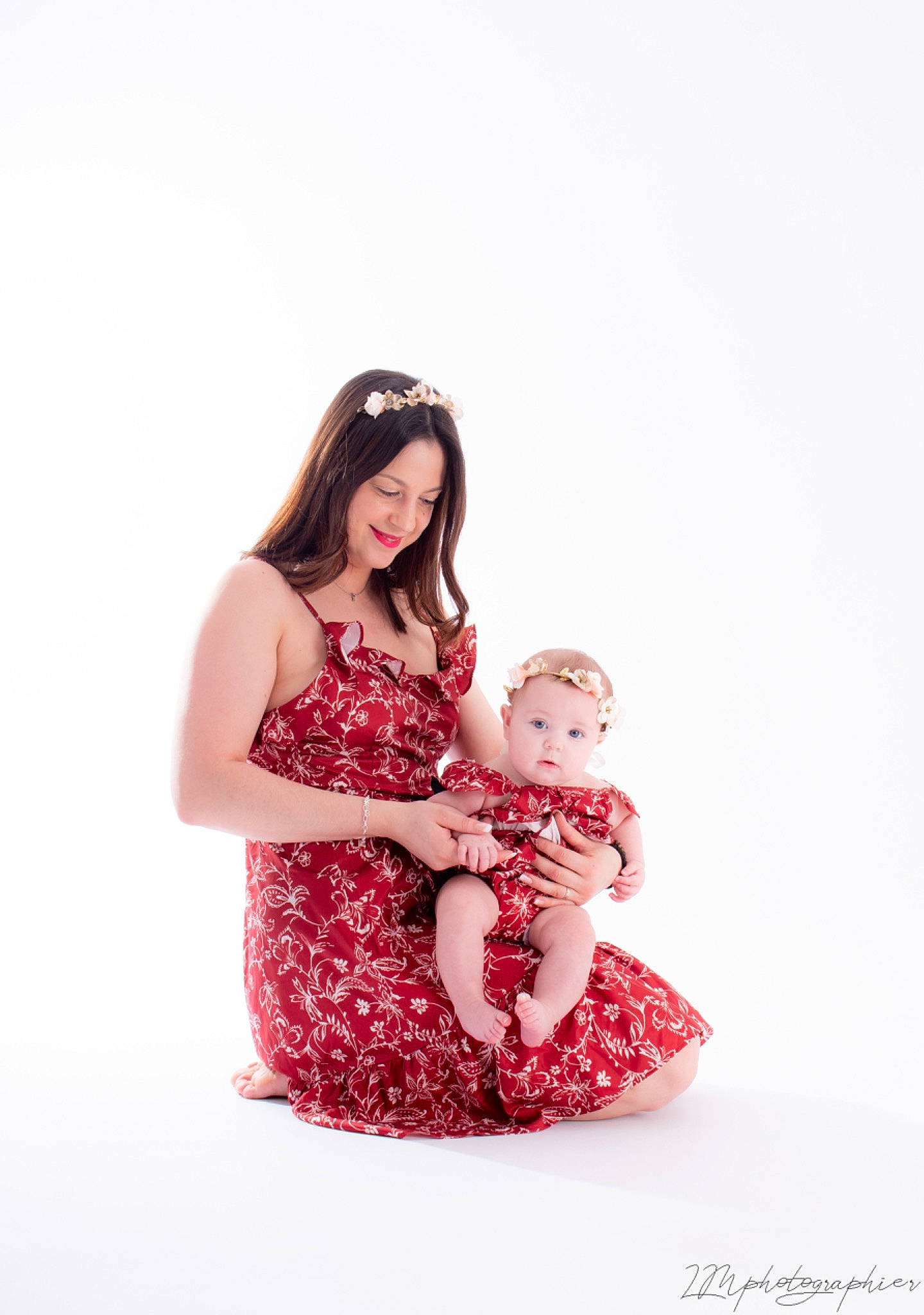 Emma participe au concours pour gagner de l'argent avec cette photo : baby, dress, event, fashion_design, flash_photography, formal_wear, gesture, happy, human_body, human_leg, joy, love, magenta, one_piece_garment, pattern, people_in_nature, person, sitting, sleeve, stock_photography