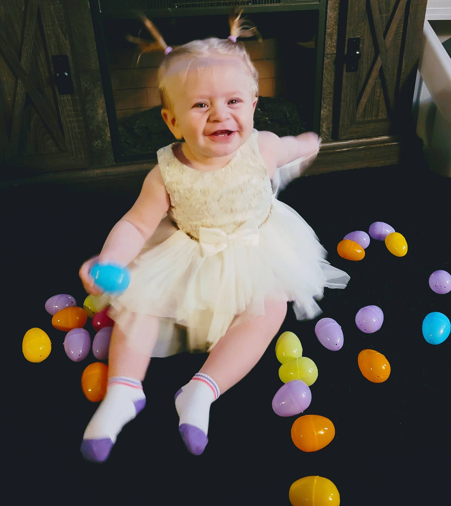 Faye joined the competition — help win amazing prizes! baby, baby_products, baby_toddler_clothing, child, dress, event, face, facial_expression, finger, flash_photography, fun, happy, joy, leisure, party_supply, person, pink, play, recreation, sitting