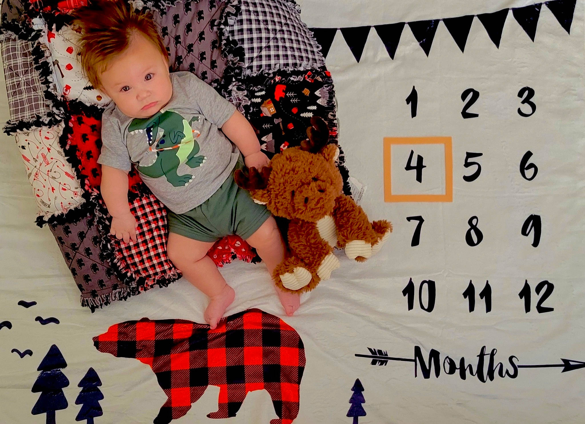 Jaxtyn joined the competition — help win amazing prizes! baby_toddler_clothing, child, comfort, design, happy, human_leg, knee, lap, leg, mammal, pattern, person, plaid, sleeve, sock, tartan, textile, thigh, toddler, toy