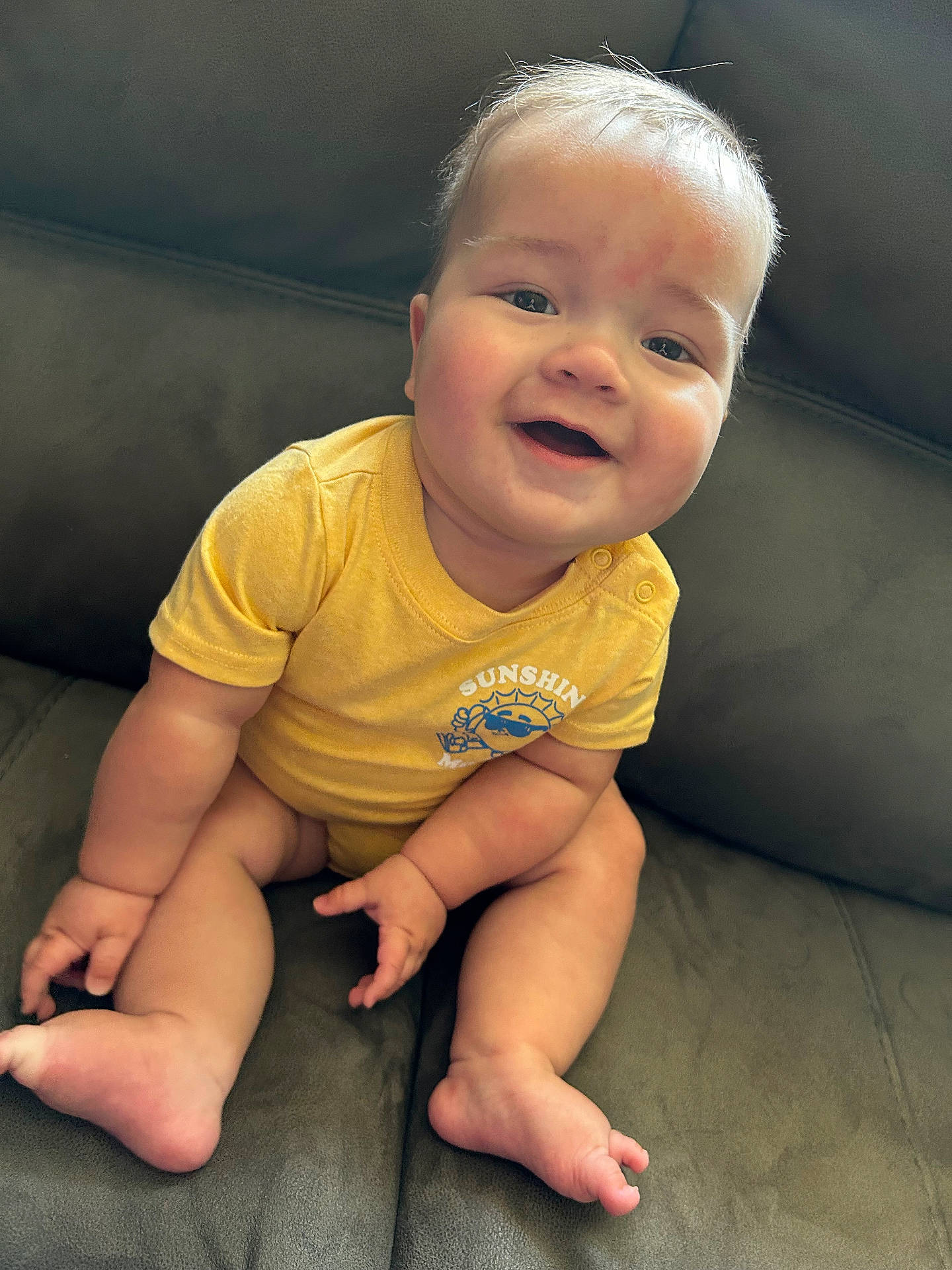 Caden is registered to the contest to win money with this photo: baby, babylaughing, blonde, bodypart, couch, crawling, cushion, face, finger, furniture, hair, hand, happy, head, laughing, person, photography, portrait, sitting, smile