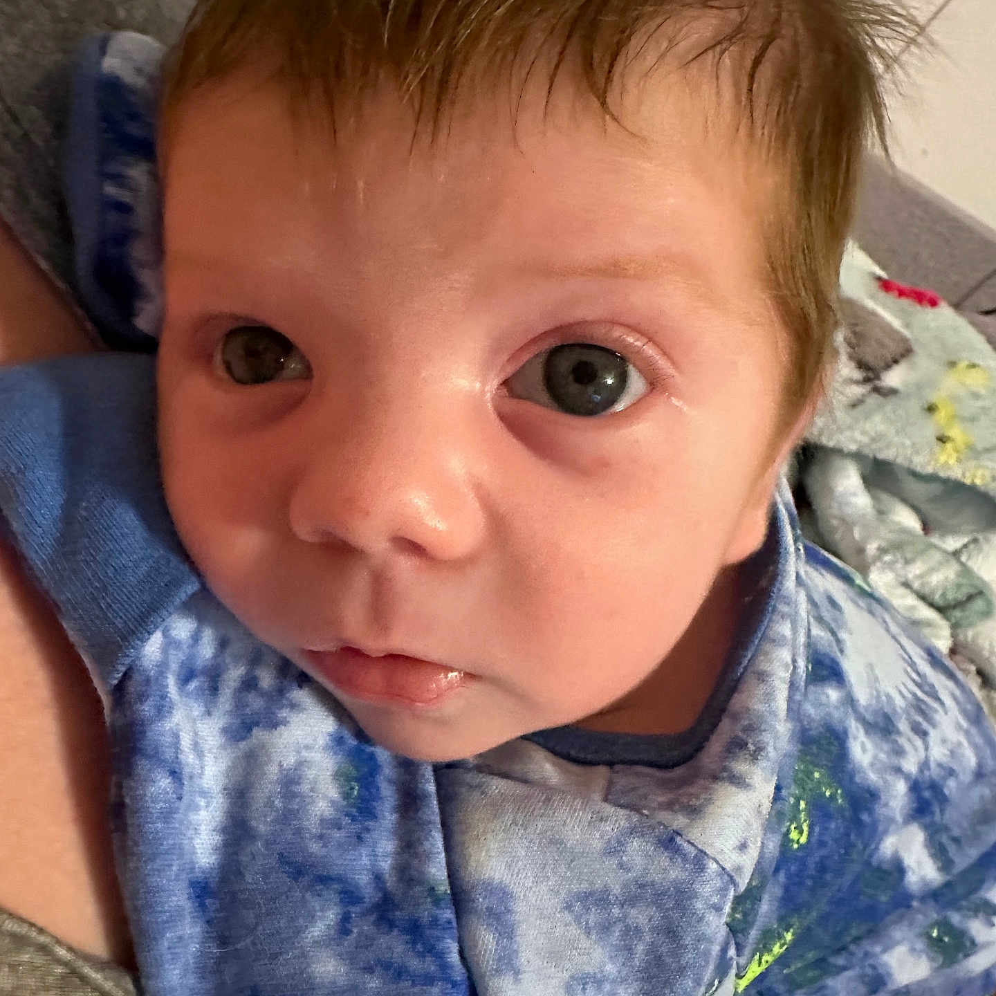 Jaxon is registered to the contest to win money with this photo: baby, blanket, bodypart, clothing, coat, cushion, face, happy, head, homedecor, mouth, newborn, person, photography, portrait, quilt, selfie, skin, smile, t_shirt