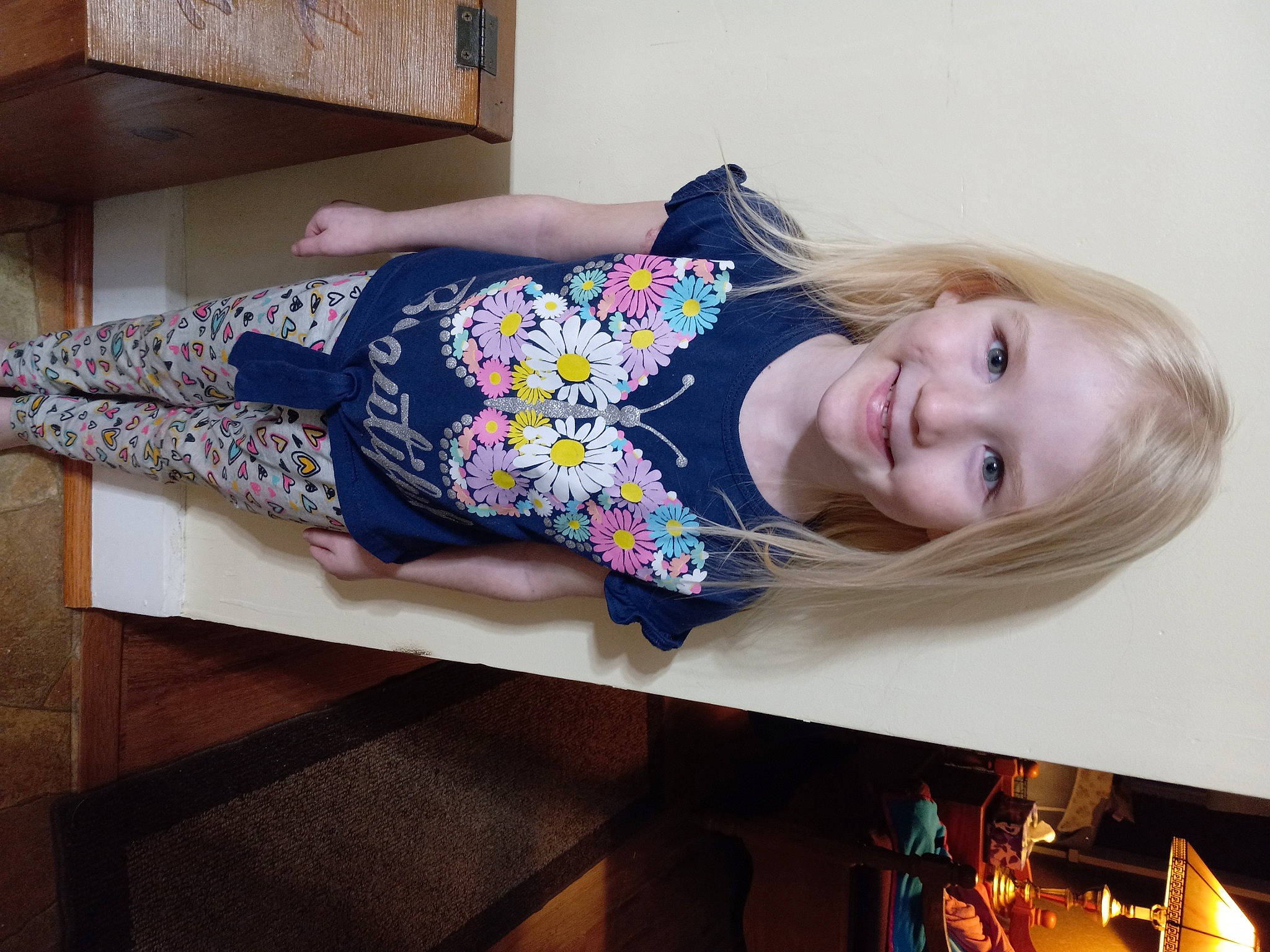 Lillyanna joined the competition — help win amazing prizes! child, comfort, dress, electric_blue, flooring, happy, hardwood, joy, magenta, pattern, person, purple, room, sitting, sleeve, smile, t_shirt, table, thigh, toddler