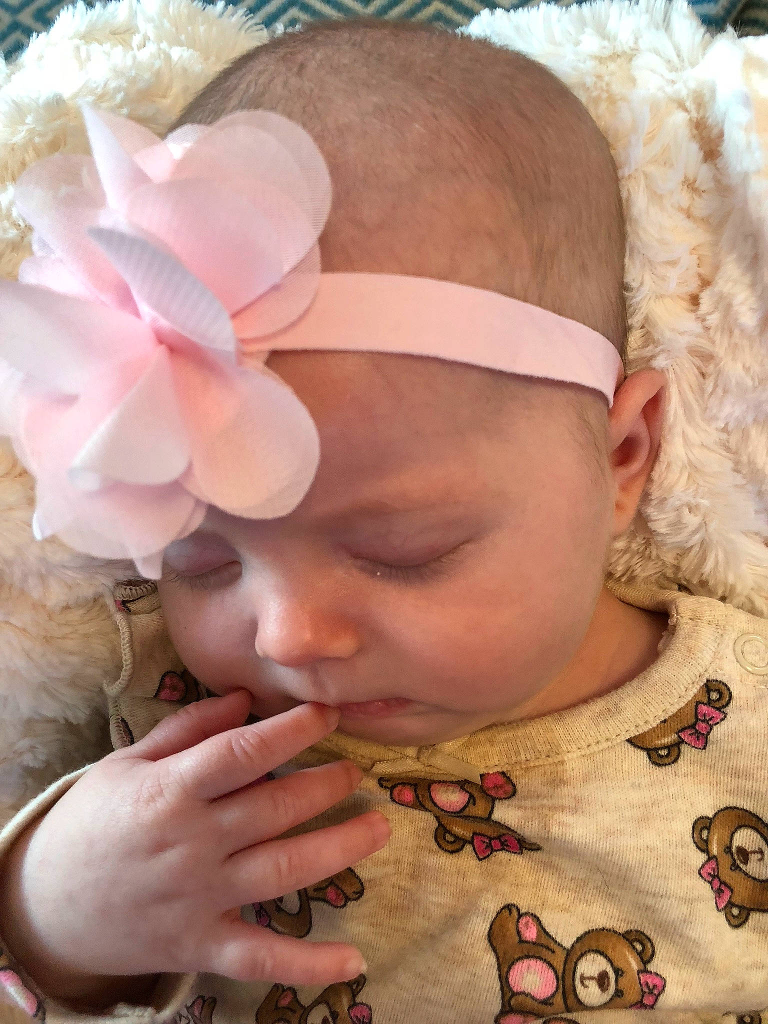 Kalliope is registered to the contest to win money with this photo: baby, cheek, chin, ear, eyebrow, eyelash, finger, forehead, gesture, hand, happy, head, headgear, headwear, lip, mouth, neck, nose, person, pink