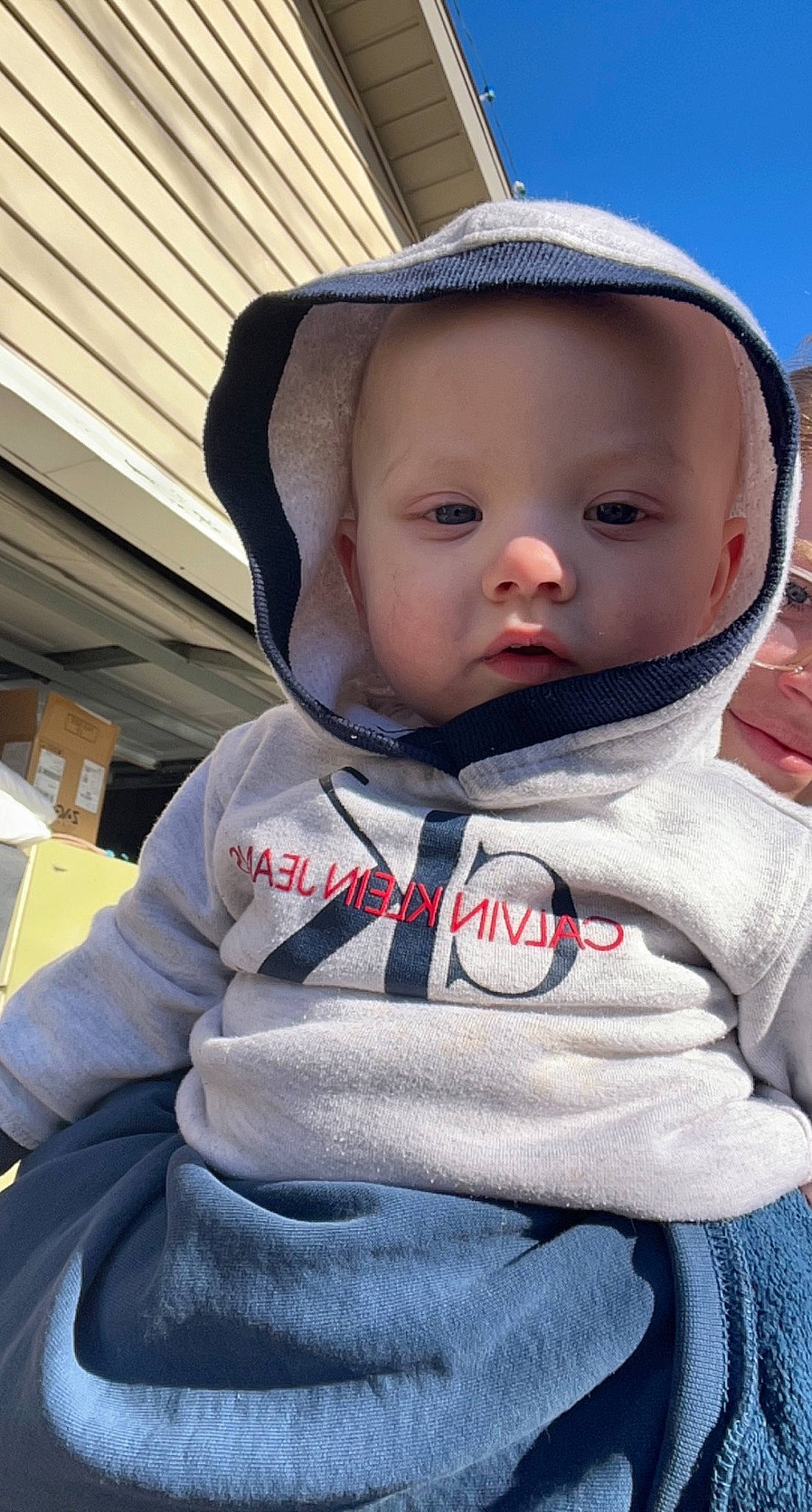 Brantley joined the competition — help win amazing prizes! baby, baby_toddler_clothing, cap, cheek, child, chin, comfort, cool, eye, fun, grass, happy, lip, nose, outerwear, person, sitting, skin, sky, sleeve