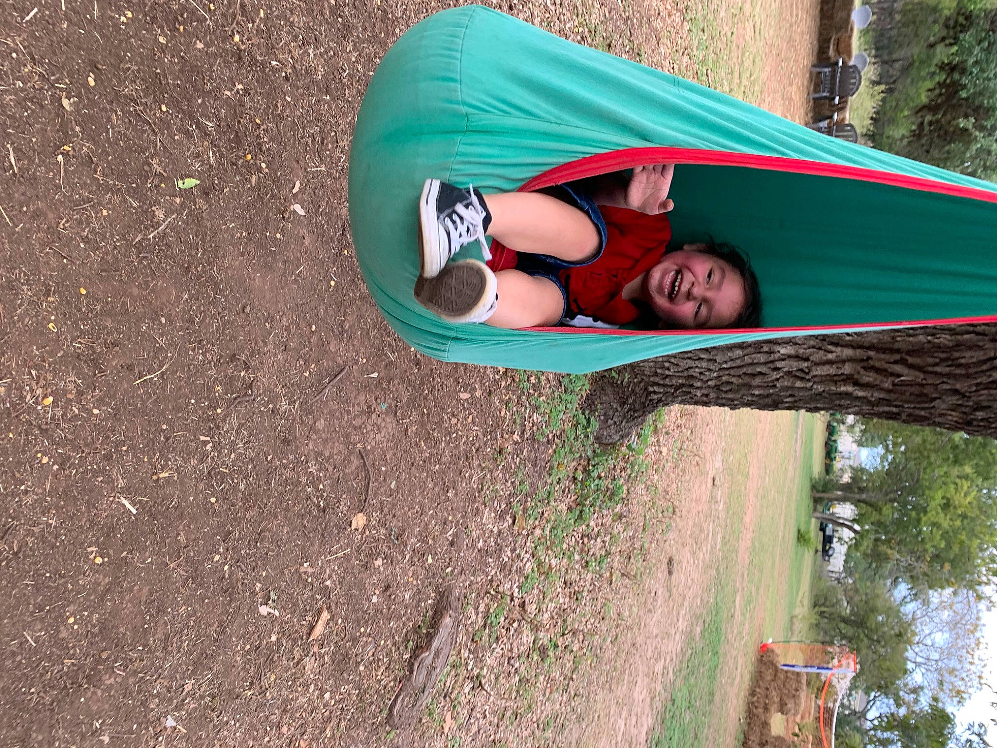 Ezekiel joined the competition — help win amazing prizes! eyewear, fun, grass, joy, landscape, leaf, leisure, outdoor_furniture, outdoor_play_equipment, people_in_nature, person, plant, recreation, shade, sitting, smile, soil, sunglasses, t_shirt, tints_and_shades