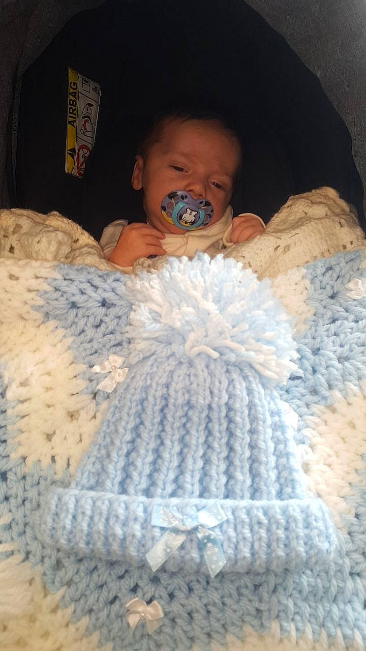 Franco is registered to the contest to win money with this photo: art, baby, blanket, blue, child, craft, crochet, knitting, person, sleep, textile, toddler, wool