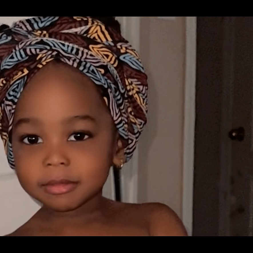 Nova joined the competition — help win amazing prizes! beauty, calm, child, closeup, door, earrings, expression, eyes, face, fashion, headwear, headwrap, home, indoor, lips, person, portrait, skin, wall, young