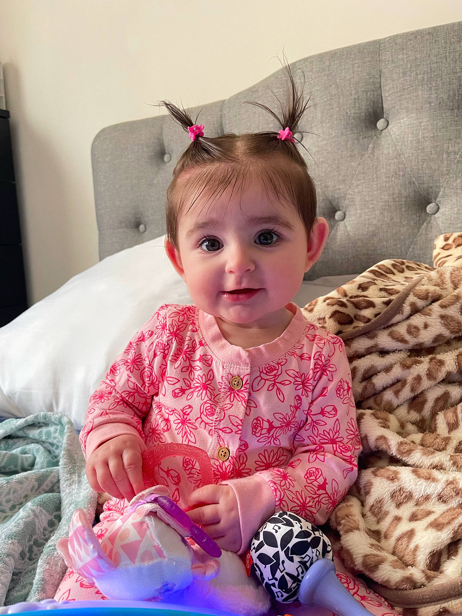 Journey is registered to the contest to win money with this photo: baby, baby_toddler_clothing, child, comfort, dress, eye, face, happy, head, iris, magenta, pattern, person, pink, purple, sitting, skin, sleeve, smile, textile