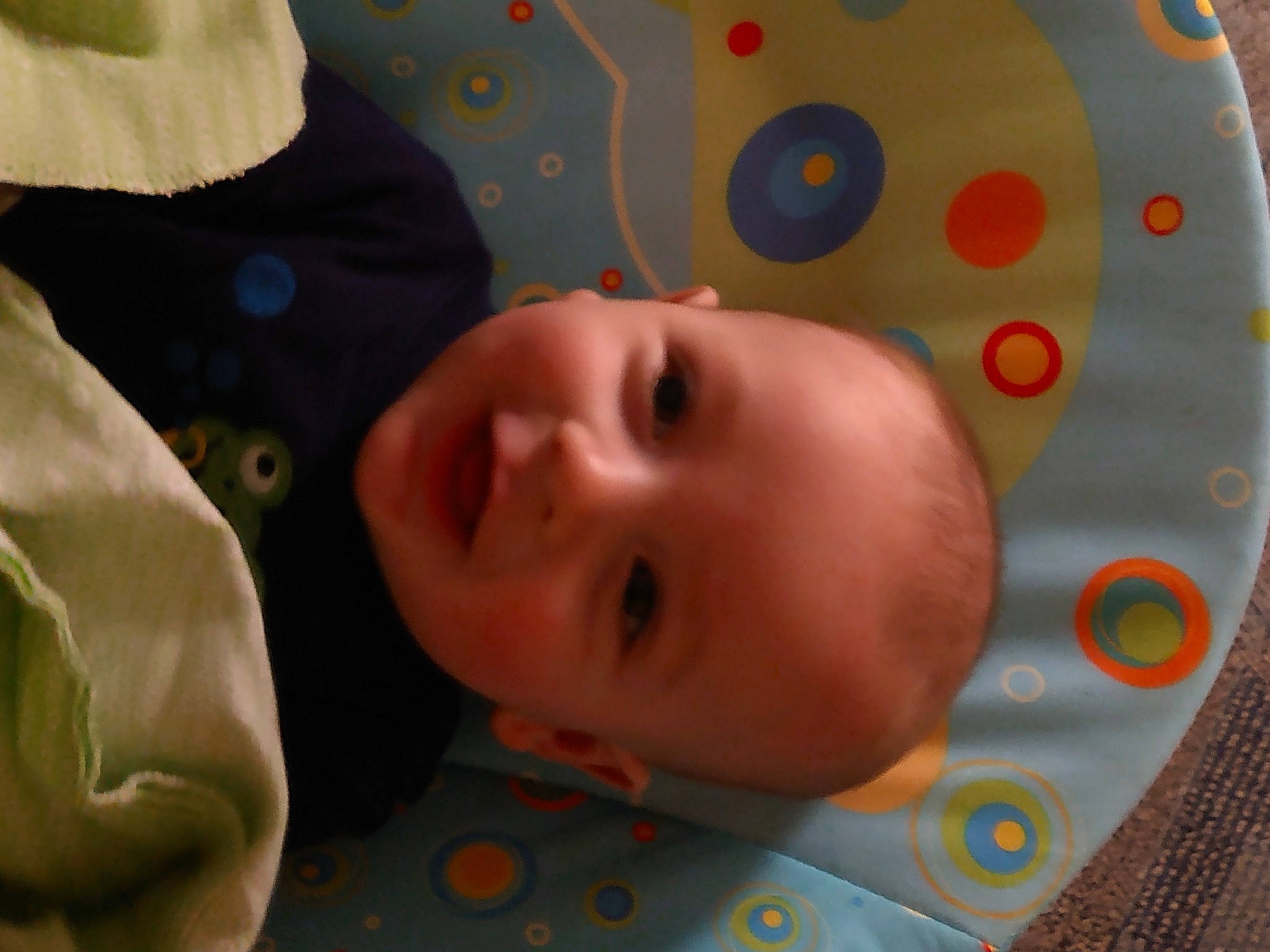 Zachariah is registered to the contest to win money with this photo: baby, baby_products, baby_toddler_clothing, cheek, child, chin, eye, eyebrow, fun, happy, head, iris, joy, linens, nose, pattern, person, skin, smile, textile