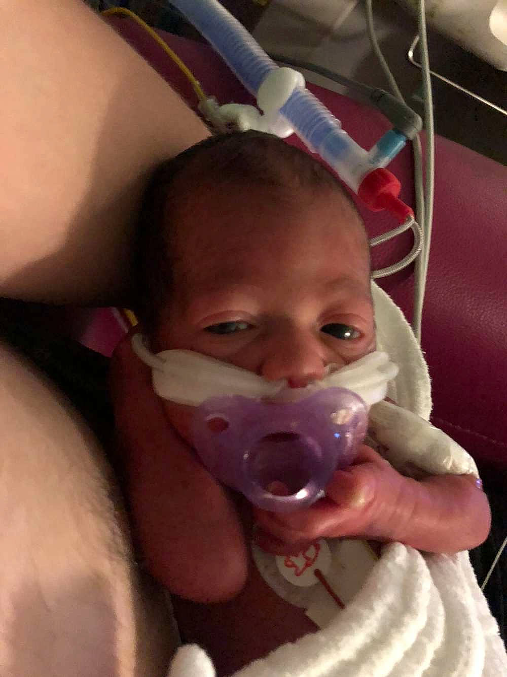 Elena participe au concours pour gagner de l'argent avec cette photo : baby, baby_toddler_clothing, bathing, bib, cheek, child, drinkware, ear, eyebrow, eyelash, head, iris, jaw, lip, mouth, nose, person, skin, smile, toddler