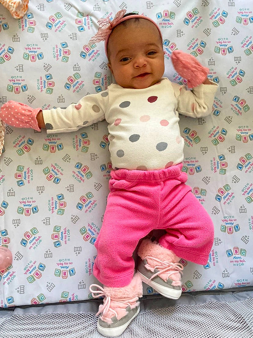 Maddison joined the competition — help win amazing prizes! baby, baby_products, baby_toddler_clothing, child, face, happy, linens, magenta, pattern, person, pink, play, polka_dot, product, sandal, skin, sleeve, smile, t_shirt, toddler