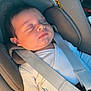 Menzio a rejoint le concours — aidez-le/la à gagner de superbes lots ! baby, baby_hand, car_interior, car_seat, child, closeup, clothing, cute, head_support, infant, newborn, peaceful, portrait, resting, safety, seatbelt, sleeping, soft_light, strap, white_outfit