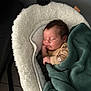 Menzio participe au concours pour gagner de l'argent avec cette photo : baby, sleeping, blanket, infant, cozy, child, face, soft, seat, comfort, indoor, cute, peaceful, resting, young, clothing, toddler, head, portrait, furniture