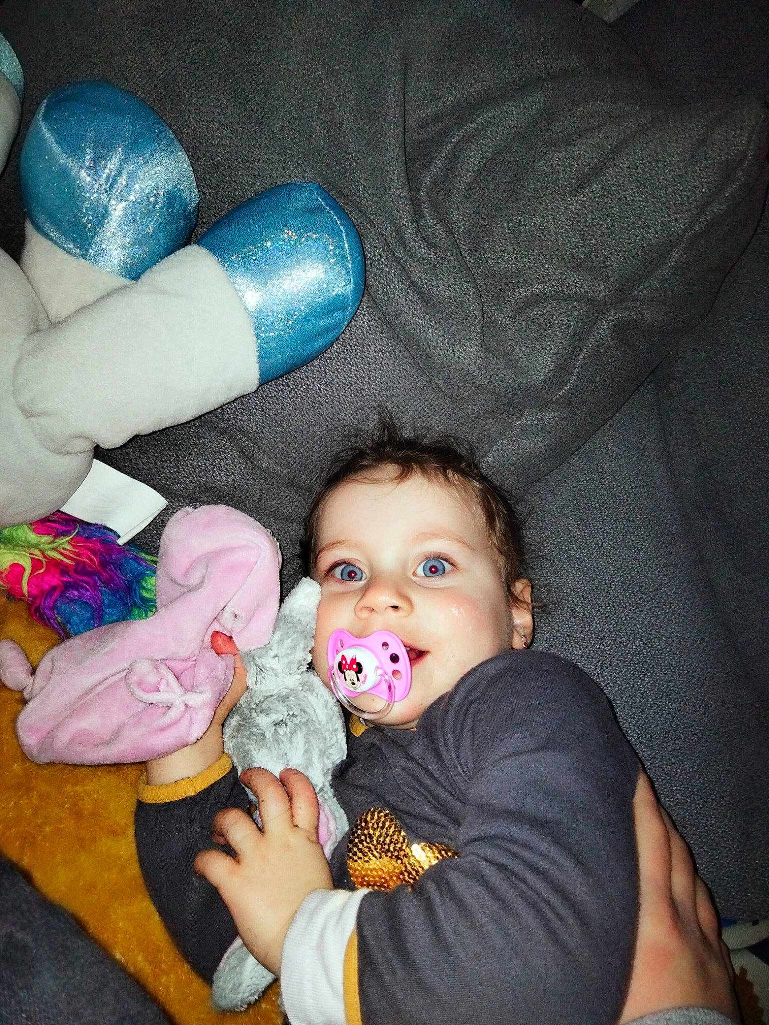 Nëllya participe au concours pour gagner de l'argent avec cette photo : arm, baby, baby_toddler_clothing, cheek, comfort, finger, fun, gesture, hand, human_body, iris, leg, mouth, nail, nose, person, skin, stuffed_toy, textile, toddler