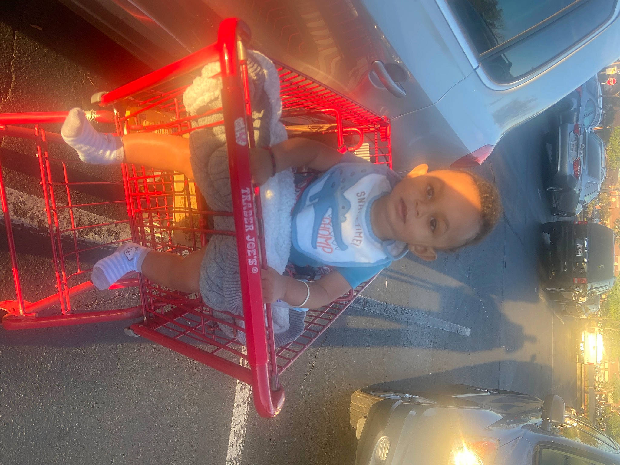 Shia is registered to the contest to win money with this photo: auto_part, automotive_design, automotive_exterior, automotive_lighting, automotive_tail_brake_light, automotive_tire, bumper, electric_blue, engineering, fun, gas, headlamp, hood, machine, motor_vehicle, person, smile, space, vehicle, vehicle_door