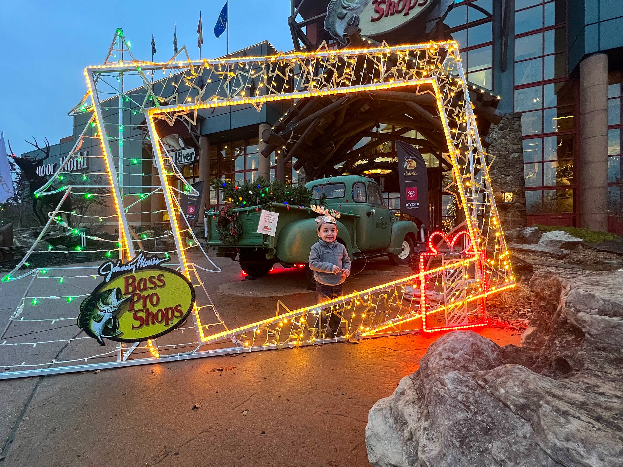 Princeton is registered to the contest to win money with this photo: asphalt, auto_part, automotive_exterior, automotive_tire, automotive_wheel_system, city, electricity, event, facade, headwear, joy, motor_vehicle, person, public_utility, road, road_surface, sky, street, tire, tree