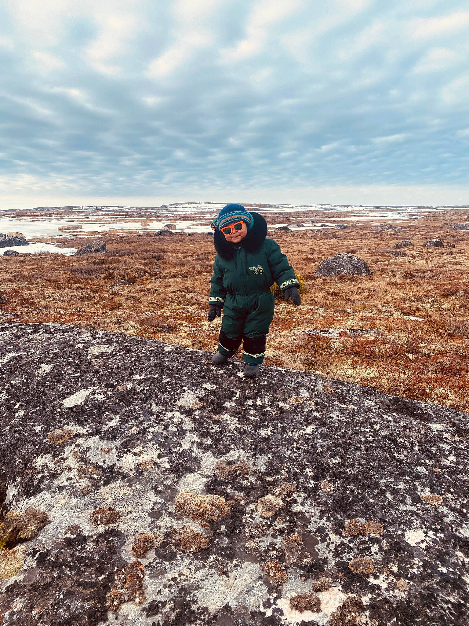 Brendan joined the competition — help win amazing prizes! bedrock, cloud, coast, fell, freezing, geology, grass, grassland, headwear, highland, hill, horizon, jacket, landscape, mountainous_landforms, people_in_nature, person, recreation, sand, sky