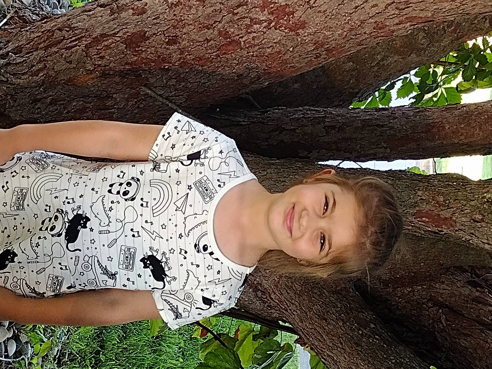 Sutton joined the competition — help win amazing prizes! black_hair, day_dress, dress, face, fawn, flash_photography, glasses, grass, happy, human_body, joy, neck, people_in_nature, person, plant, skin, smile, thigh, tree, trunk