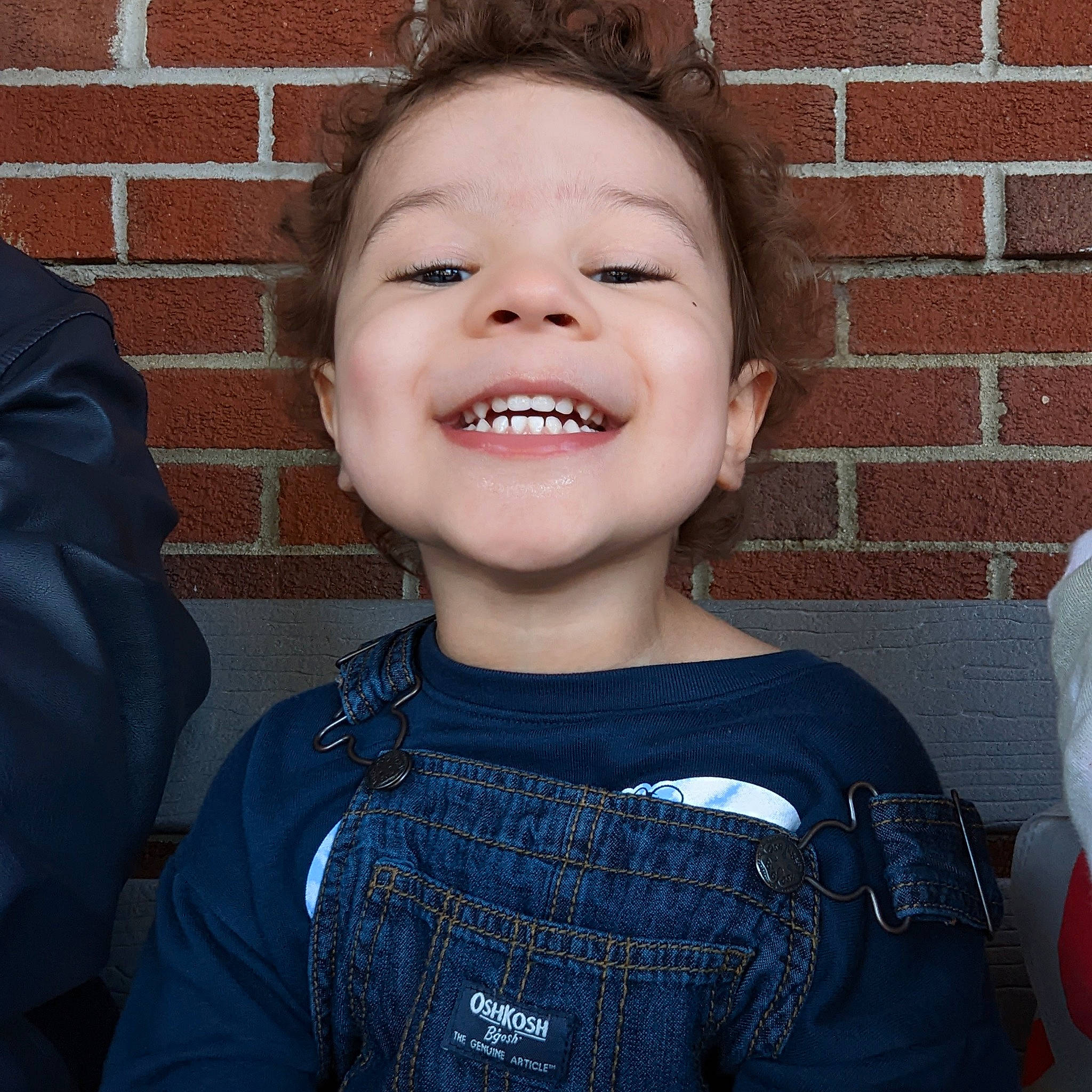 Greyson is registered to the contest to win money with this photo: cheek, chin, cool, eyebrow, eyelash, flash_photography, forehead, gesture, hairstyle, happy, iris, jaw, joy, lip, mouth, neck, nose, person, sleeve, smile