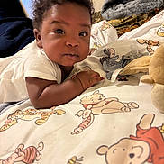 Alexander joined the competition — help win amazing prizes! baby, bedroom, blanket, child, clothing, comfort, cozy, curly_hair, cute, face, indoor, infant, lying_down, person, plush_toy, portrait, soft_toys, toddler, winnie_the_pooh, young_child