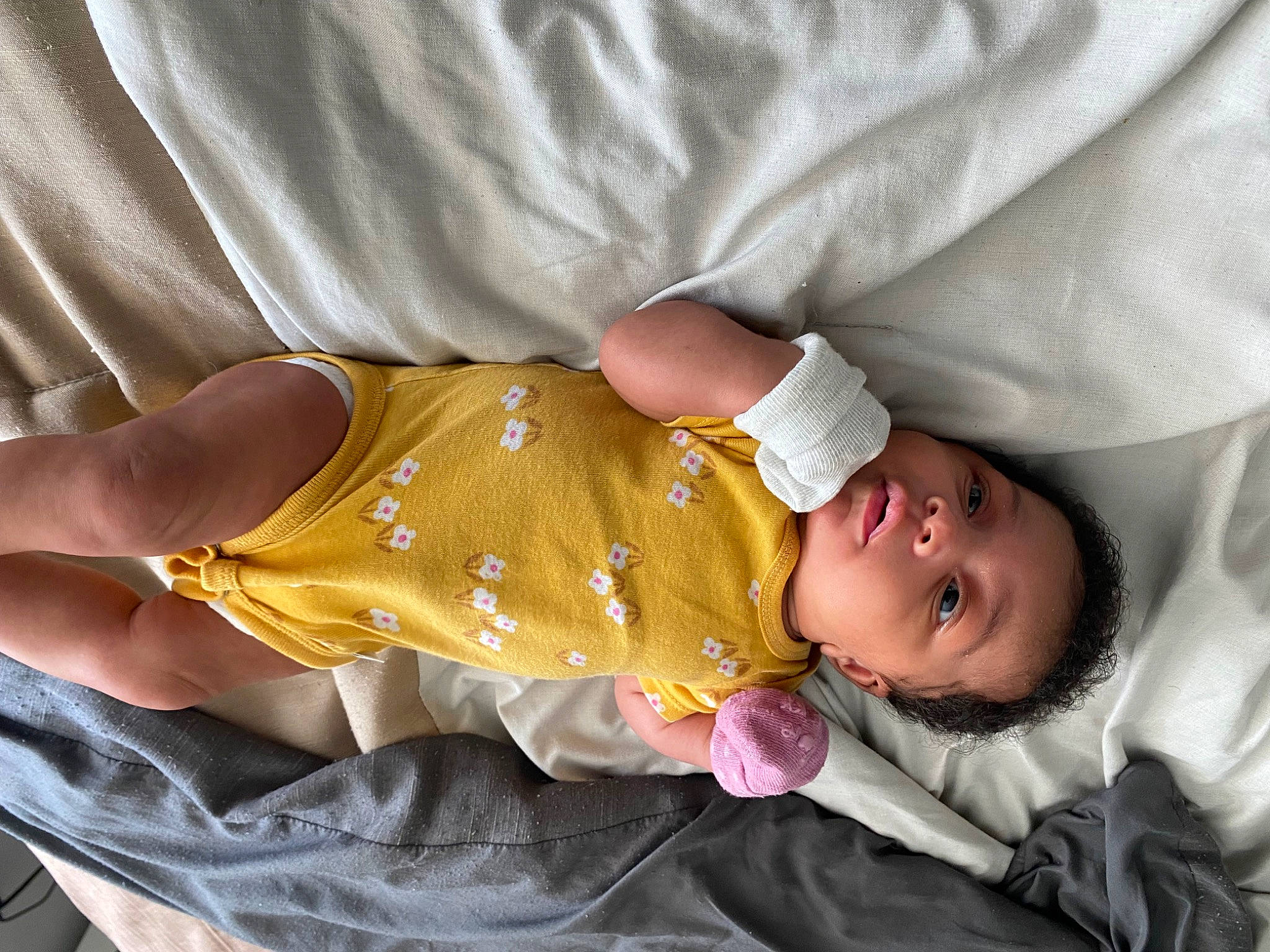 Kenya joined the competition — help win amazing prizes! baby, baby_carriage, baby_products, baby_sleeping, baby_toddler_clothing, bedtime, child, comfort, elbow, finger, gesture, happy, human_body, linens, mouth, nap, person, sitting, sleeve, smile