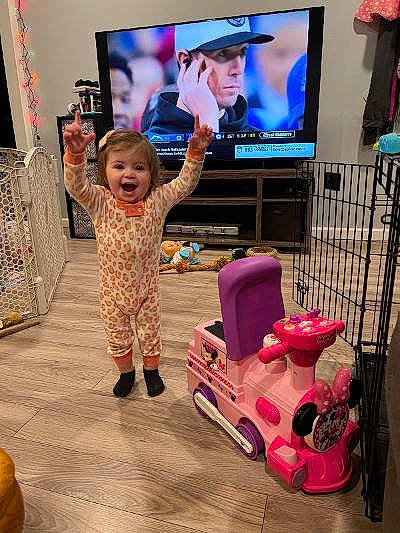 Callie joined the competition — help win amazing prizes! automotive_design, baby, child, display_device, event, flooring, fun, headwear, leisure, magenta, motor_vehicle, person, pink, product, riding_toy, smile, television, television_set, tire, toddler