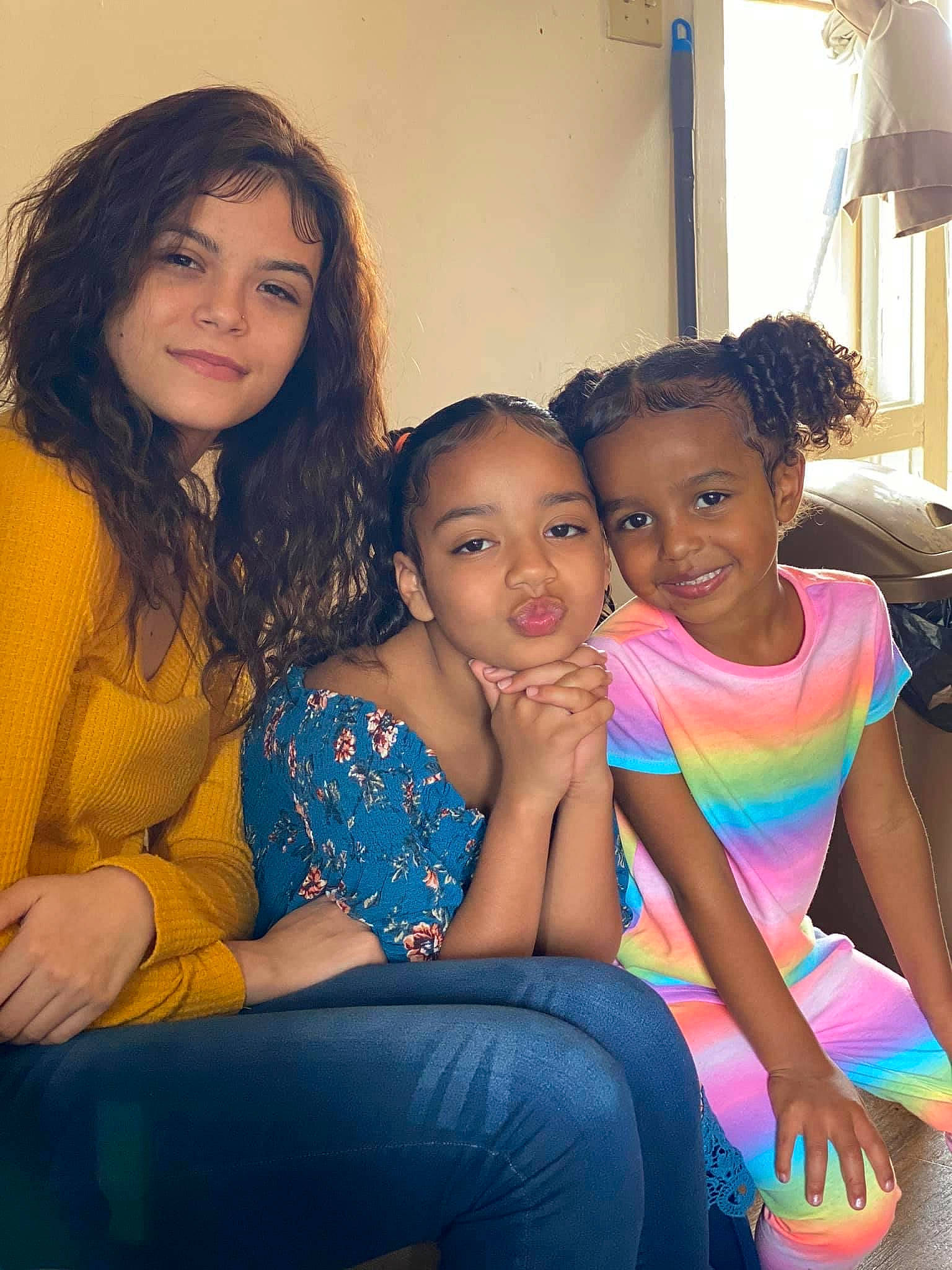 Lavaeh Grace is registered to the contest to win money with this photo: arm, black_hair, curtain, event, face, fashion_design, flash_photography, friendship, fun, happy, iris, joy, lamp, leisure, person, shoulder, sitting, skin, smile, t_shirt