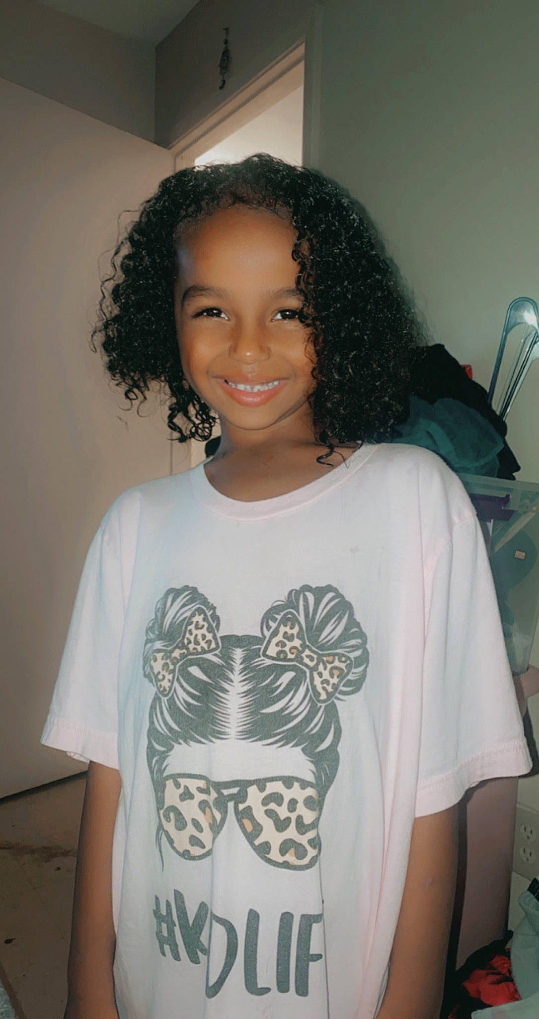 Lavaeh Grace is registered to the contest to win money with this photo: black, black_hair, cheek, cool, forehead, hair, hairstyle, happy, head, human_body, jheri_curl, joint, joy, neck, organ, person, ringlet, shoulder, sleeve, smile
