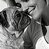 Missy joined the competition — help win amazing prizes! woman, dog, pug, black_and_white, portrait, smiling, face, pet, human, affection, close_up, animal, love, companionship, indoor, cute, friendly, happy, nose_to_nose, light_and_shadow