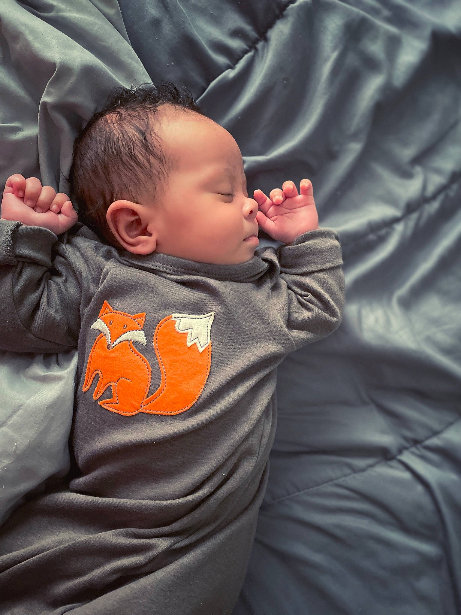 August joined the competition — help win amazing prizes! arm, baby, baby_toddler_clothing, cheek, child, chin, comfort, eye, flash_photography, fun, gesture, happy, mouth, nose, orange, outerwear, person, sitting, sleeve, textile