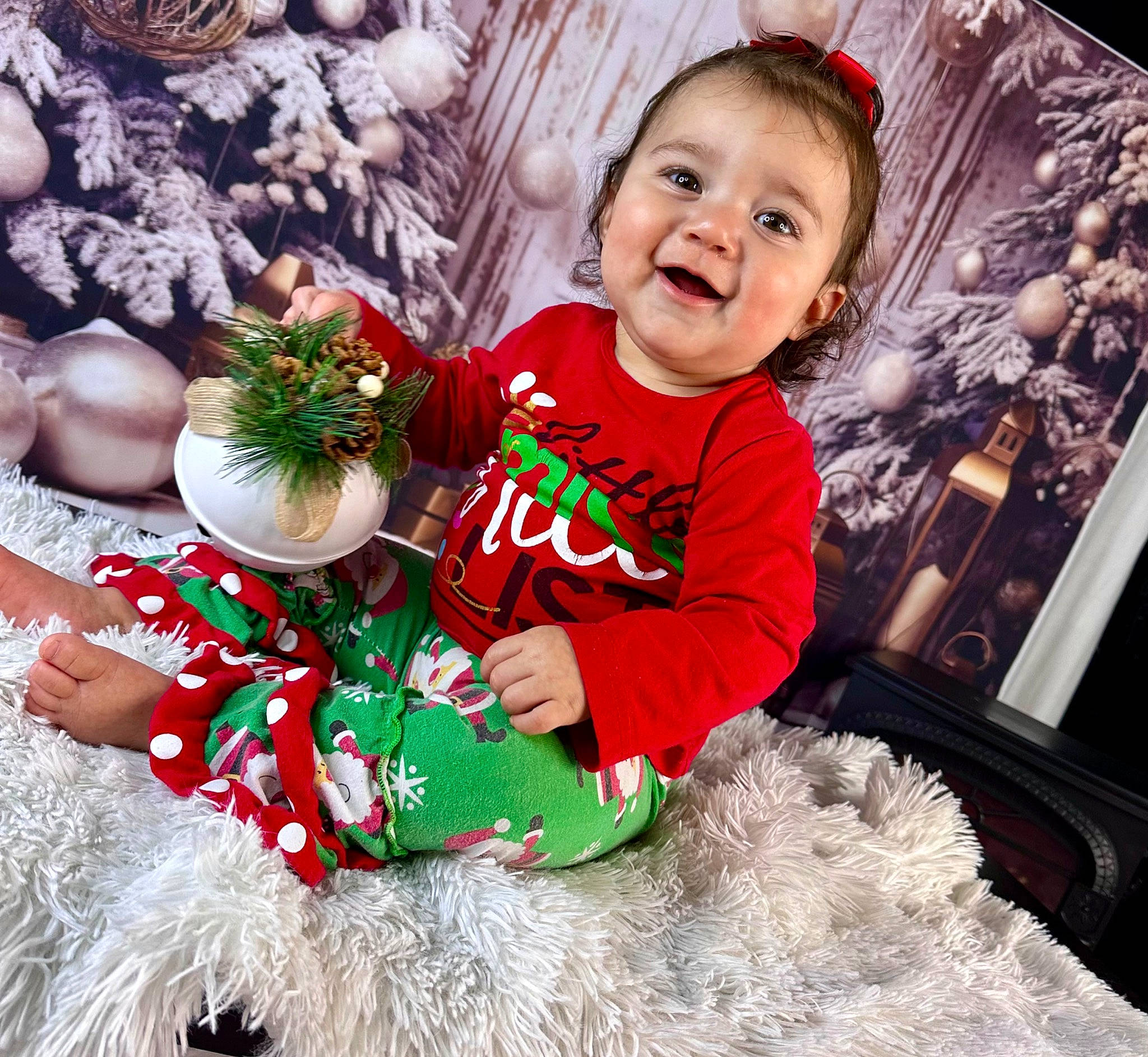 Adalyn Hunter is registered to the contest to win money with this photo: baby, baby_toddler_clothing, child, christmas, christmas_decoration, christmas_eve, christmas_ornament, event, fictional_character, happy, holiday, holiday_ornament, joy, mammal, ornament, person, red, sleeve, smile, toddler
