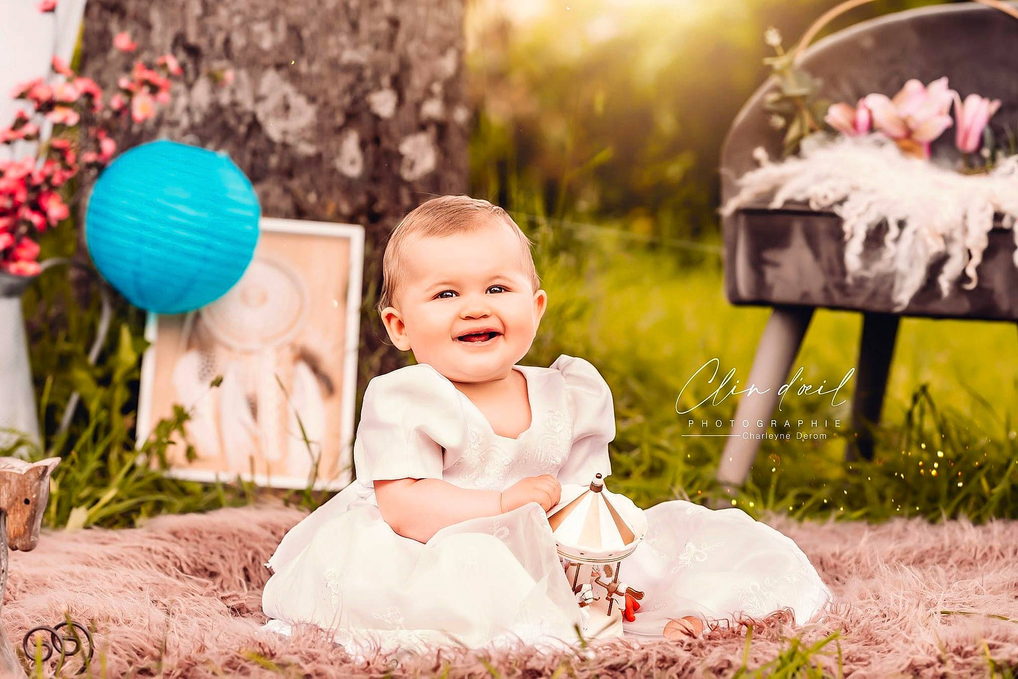 Lyana participe au concours pour gagner de l'argent avec cette photo : baby, baby_toddler_clothing, beauty, child, dress, event, flash_photography, fun, grass, happy, joy, people, people_in_nature, person, photograph, pink, plant, smile, snapshot, summer