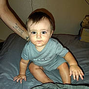 Ace joined the competition — help win amazing prizes! baby, bed, casual, child, cute, expression, eyes, face, gray_clothing, hand, indoor, infant, looking, person, room, short_hair, sitting, skin, tattoo, toddler