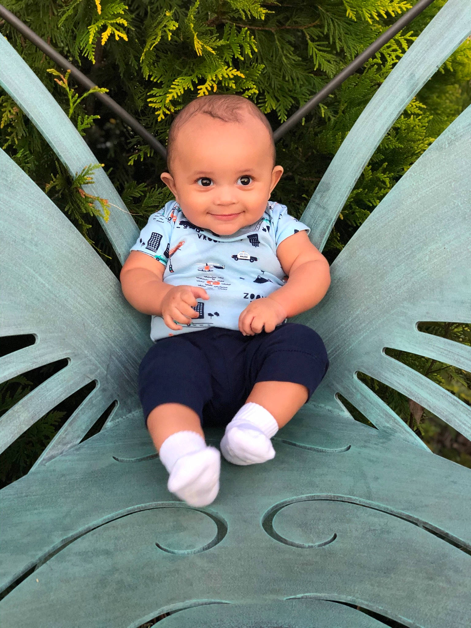 Lucca is registered to the contest to win money with this photo: automotive_tire, automotive_wheel_system, azure, baby, baby_toddler_clothing, cool, design, eye, flash_photography, grass, happy, joy, leaf, leisure, nature, person, plant, sitting, smile, standing