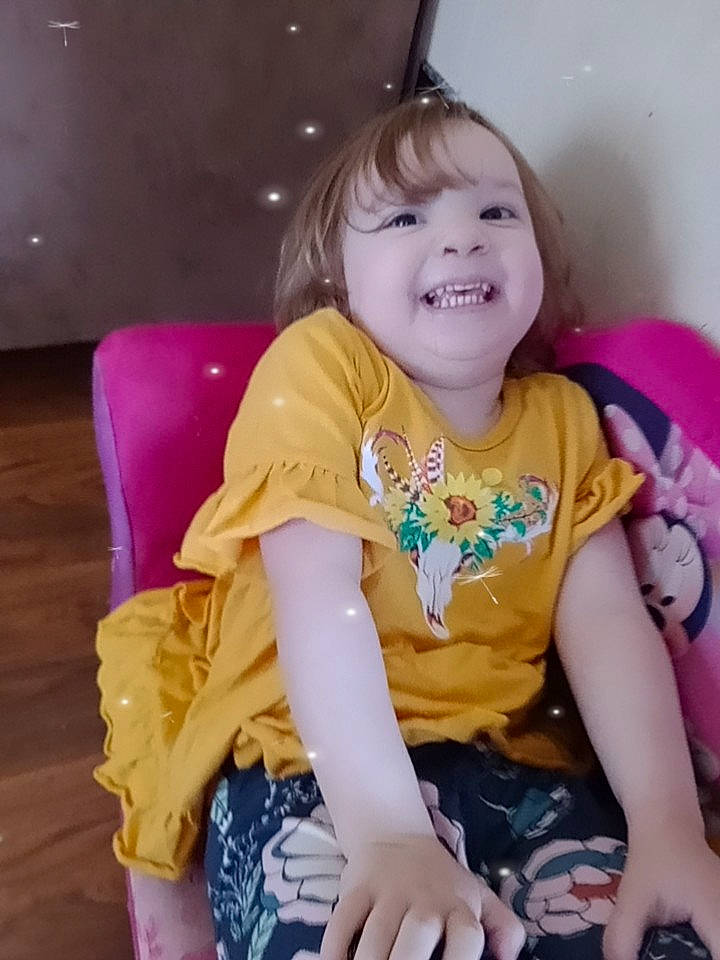 Faith joined the competition — help win amazing prizes! baby_toddler_clothing, cheek, chin, comfort, face, facial_expression, fun, happy, head, human_body, iris, joy, neck, person, pink, purple, shoulder, skin, sleeve, smile