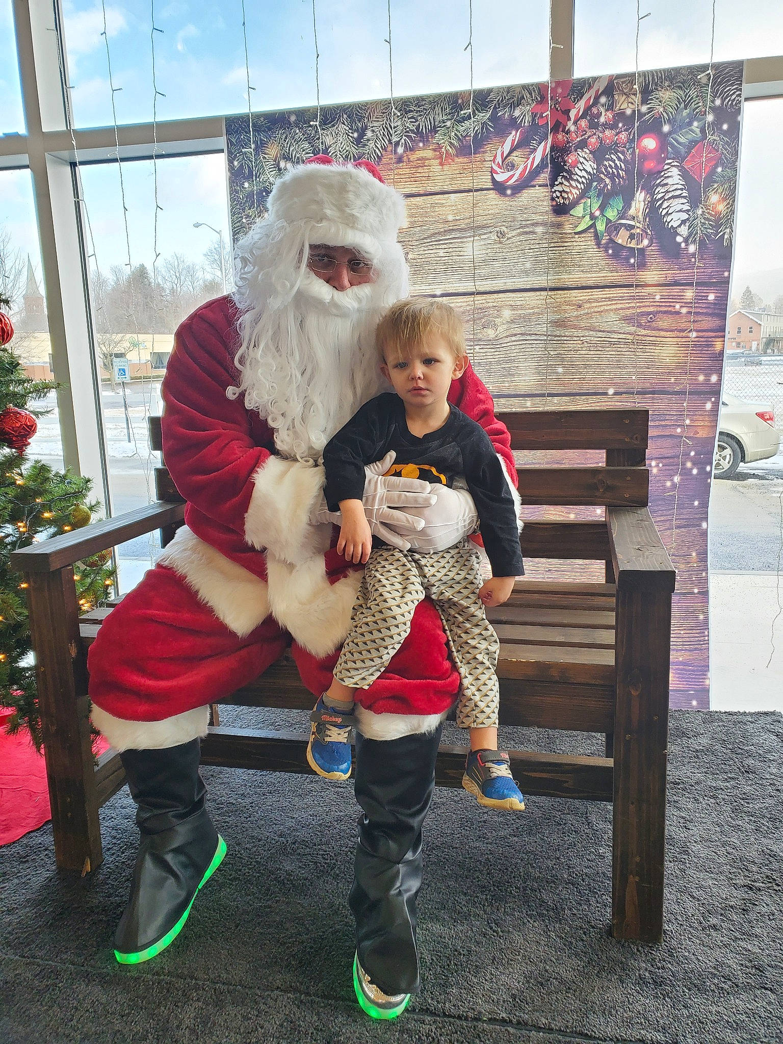 Nathan joined the competition — help win amazing prizes! beard, child, christmas, cosplay, costume, event, fictional_character, footwear, fun, fur, holiday, lap, person, santa_claus, shoe, tree, vacation