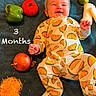 Nala joined the competition — help win amazing prizes! baby, infant, toddler, smiling, onesie, headband, bow, taco_pattern, blanket, vegetables, green_bell_pepper, tomato, onion, shredded_cheese, daikon, milestone, text_overlay, cute, lying_down, happy