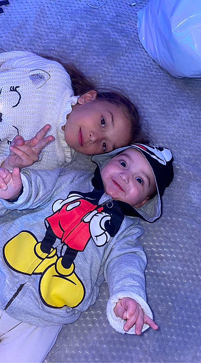 Ayna participe au concours pour gagner de l'argent avec cette photo : baby, baby_toddler_clothing, beauty, cheek, child, comfort, grass, happy, headwear, joy, mouth, nose, pattern, people, person, pink, product, purple, skin, smile