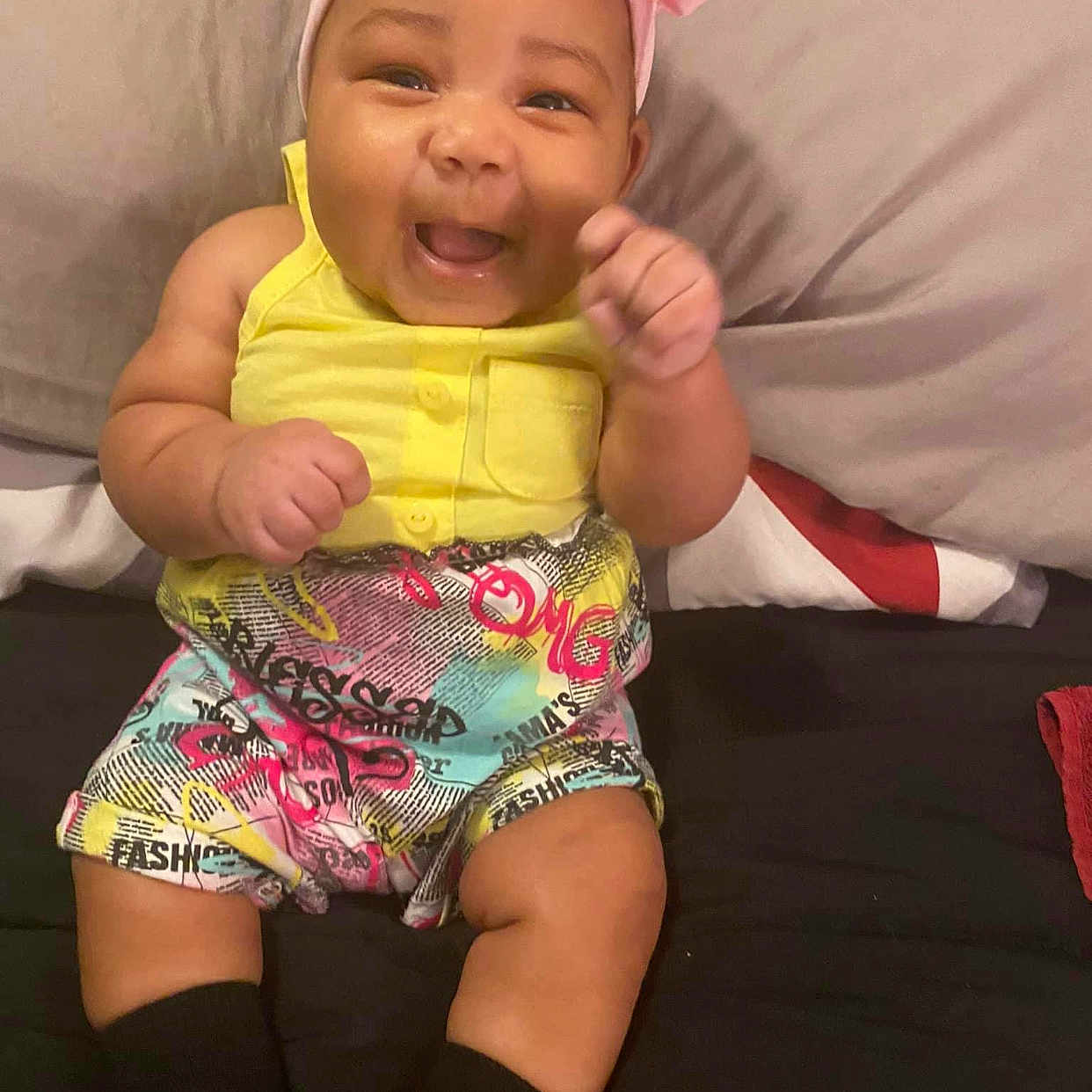 Carlei joined the competition — help win amazing prizes! baby, babylaughing, clothing, couch, cushion, face, furniture, happy, hat, head, homedecor, indoors, laughing, pants, person, photography, portrait, shorts, sitting, smile