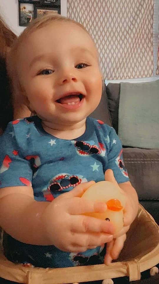 Cole is registered to the contest to win money with this photo: arm, baby, baby_toddler_clothing, cheek, chin, eye, face, facial_expression, finger, happy, human_body, iris, lip, mouth, nose, organ, person, skin, sleeve, smile