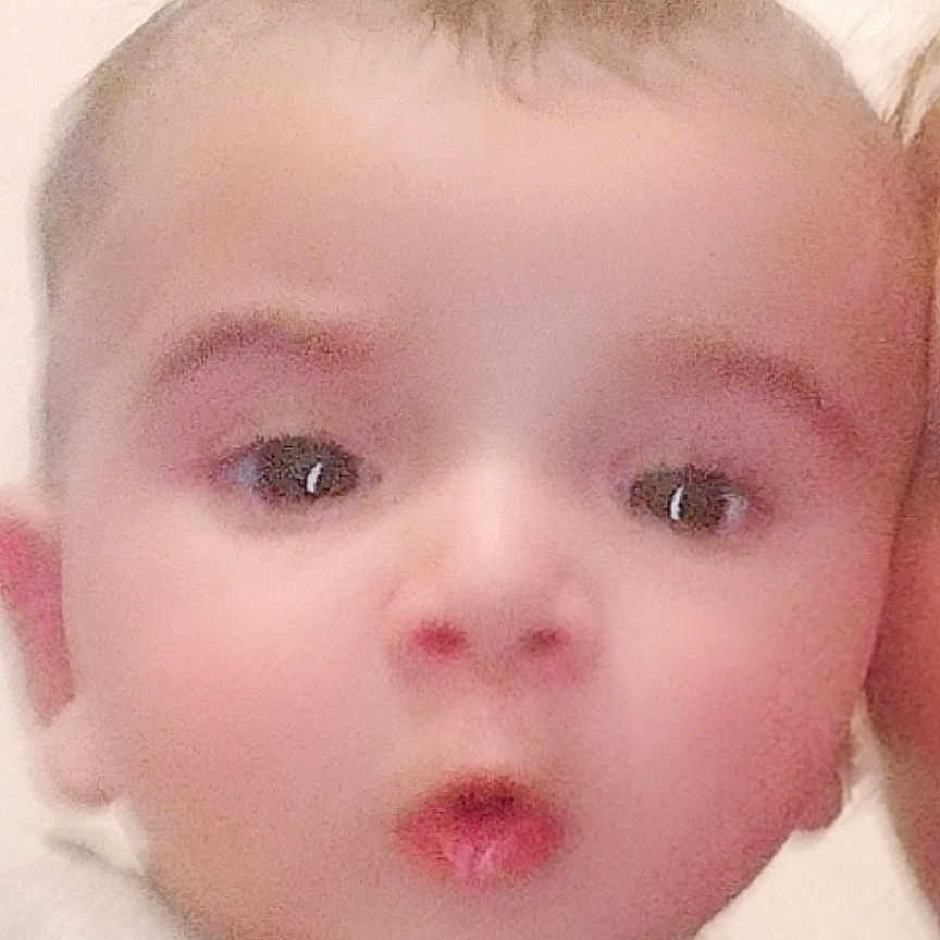 Rayansh joined the competition — help win amazing prizes! baby, blurry, child, closeup, cute, expression, eyes, face, hair, head, human, indoors, infant, mouth, person, portrait, skin, soft_light, white_clothing, young