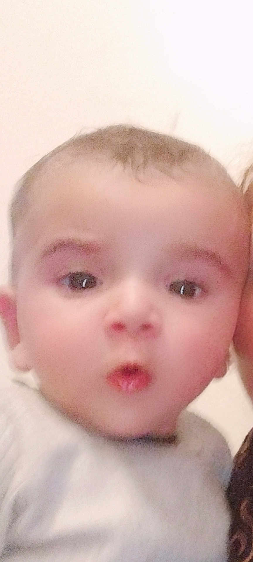 Rayansh joined the competition — help win amazing prizes! baby, blurry, child, closeup, cute, expression, eyes, face, hair, head, human, indoors, infant, mouth, person, portrait, skin, soft_light, white_clothing, young