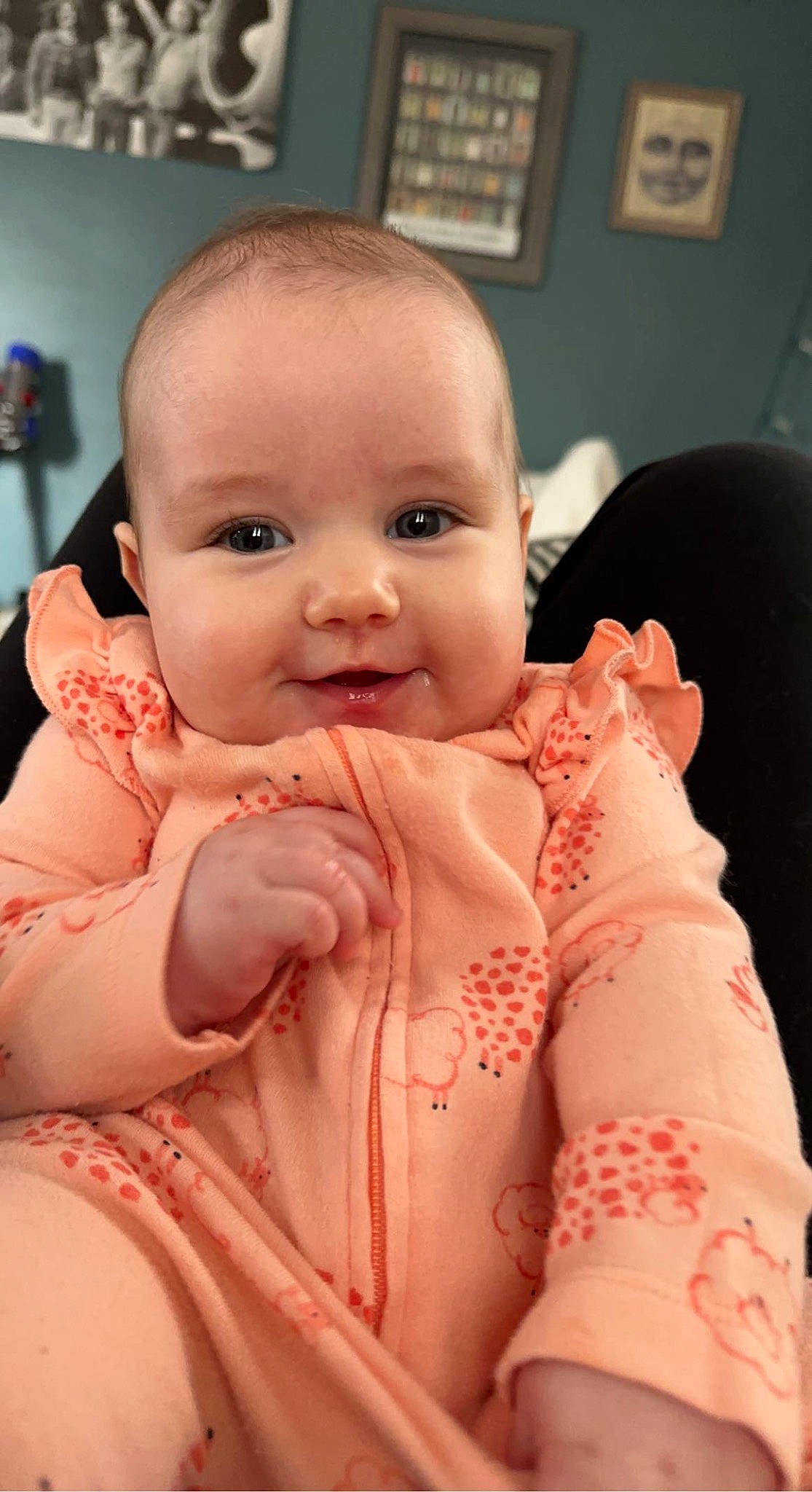 Rory is registered to the contest to win money with this photo: arm, baby, baby_toddler_clothing, cheek, eye, eyebrow, eyelash, finger, happy, head, iris, joy, lip, mouth, nose, person, picture_frame, pink, skin, sleeve
