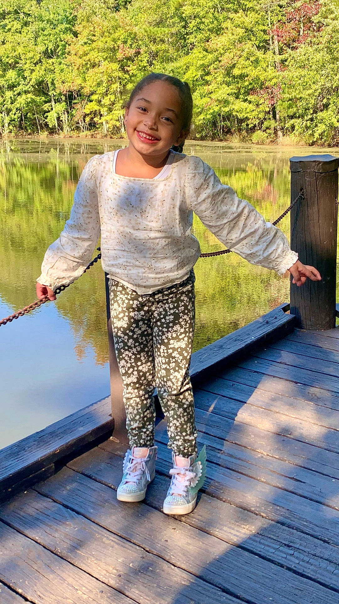 Alana Nevaeh joined the competition — help win amazing prizes! child, clothing, face, female, footwear, girl, head, lake, nature, pants, person, photography, pier, plant, port, portrait, shoe, tree, water, waterfront